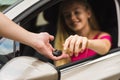 Focus on car key hand to hand Royalty Free Stock Photo