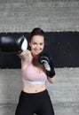 A young smiling girl. Who is a big fan of sports and especially boxing Royalty Free Stock Photo