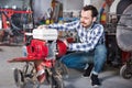 Smiling guy gas plow for work Royalty Free Stock Photo