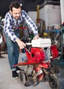 Smiling guy gas plow for work Royalty Free Stock Photo