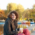 Young smiling happy man portrait in autumn portrait Royalty Free Stock Photo