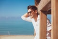 Young smiling happy man on beach vacation Royalty Free Stock Photo