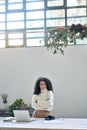 Young happy business woman executive standing in office, vertical portrait. Royalty Free Stock Photo