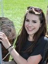 Smiling young lady in parade