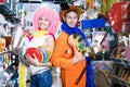 Man with girlfriend together at festive accessories shop Royalty Free Stock Photo