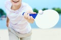 Young man playing with matkot rackets Royalty Free Stock Photo
