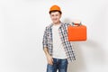 Young smiling man in protective construction orange helmet holding case with instruments or toolbox isolated on white Royalty Free Stock Photo