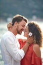 Young man and girl in love kissing by the lake Royalty Free Stock Photo