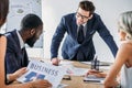 young smiling multicultural businesspeople working on project Royalty Free Stock Photo