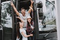 Young Smiling People Traveling on Tourist Bus Royalty Free Stock Photo