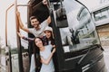Young Smiling People Traveling on Tourist Bus Royalty Free Stock Photo