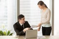 Young smiling personal assistant giving document to boss, paperw