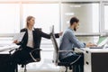 Young smiling personal assistant giving document to office worker in his office, female accountant reporting great work to ceo, Royalty Free Stock Photo