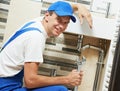 Young smiling plumber man worker Royalty Free Stock Photo