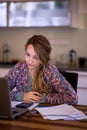 Young smiling pretty woman student using laptop Royalty Free Stock Photo