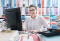 Young secretary working and smiling Royalty Free Stock Photo