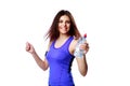 Young smiling sport woman holding bottle with water Royalty Free Stock Photo
