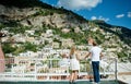 Young smiling tender romantic couple in Positano, Italy