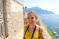 Young smiling traveler woman in Atrani village, Amalfi Coast, It Royalty Free Stock Photo