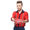 Young smiling vintage man holding gift