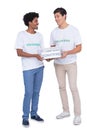 Young smiling volunteers collecting donations Royalty Free Stock Photo