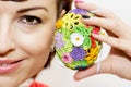 Young smiling woman with colorful easter egg Royalty Free Stock Photo