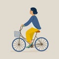 Young smiling woman or girl dressed in casual clothes riding bicycle. Female character on bike. Pedaling cyclist