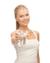 Young smiling woman with glass of water Royalty Free Stock Photo