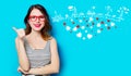 Young smiling woman in glasses and abstract hearts Royalty Free Stock Photo