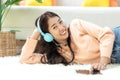 Young smiling woman happy listen music for chill and relax in summer holiday. Royalty Free Stock Photo