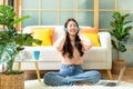 Young smiling woman happy listen music for chill and relax in summer holiday. Lifestyle girl using laptop for entertainment Royalty Free Stock Photo