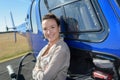 Young smiling woman helicopter pilot Royalty Free Stock Photo