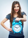 Young smiling woman hold watch. Beautiful smiling girl portrait Royalty Free Stock Photo