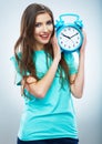 Young smiling woman hold watch. Beautiful smiling girl portrait Royalty Free Stock Photo