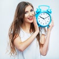 Young smiling woman hold watch. Beautiful smiling girl portrait Royalty Free Stock Photo