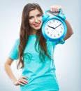 Young smiling woman hold watch. Beautiful smiling girl portrait Royalty Free Stock Photo