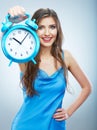 Young smiling woman hold watch. Beautiful smiling girl portrait Royalty Free Stock Photo