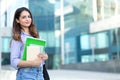 Young smiling woman holding books, study, education, knowledge, goal concept Royalty Free Stock Photo