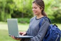 Young smiling woman holding her laptop Royalty Free Stock Photo