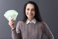 Young smiling woman holding lot of euro bills in her hands Royalty Free Stock Photo