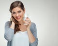 Young smiling woman holding water glass. Isolated studio portrait Royalty Free Stock Photo