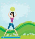 Young smiling woman makes exercise with fitball