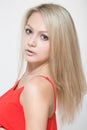 Young smiling woman in red dress. Isolated over white background. Royalty Free Stock Photo