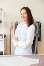 Young smiling woman seamstress looking camera Royalty Free Stock Photo