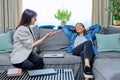 Young smiling woman on therapy session in psychologist office Royalty Free Stock Photo