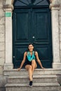 Young smiling woman travelling and visiting Europe.Summer touring Europe and Mediterranean culture.Colourful streets,old Royalty Free Stock Photo