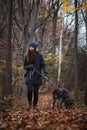 Young, smiling woman on a walk with the eternal stalker of the Barbu tcheque breed. Candid abort young girls aged 20-24 and a