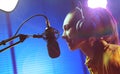 Young woman working at the radio broadcasting station