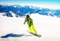 Young snowboarder ride downhill in scenic caucasus mountains in fast freeze motion steep downhill solo Royalty Free Stock Photo