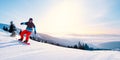 Young Snowboarder Riding Red Snowboard in Mountains at Sunny Day. Snowboarding and Winter Sports Royalty Free Stock Photo